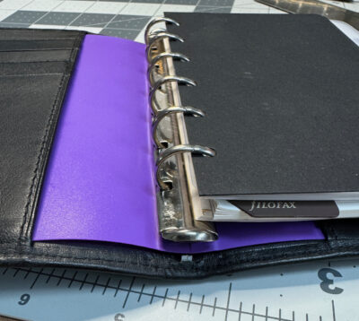 plastic ring holder in pocket filofax